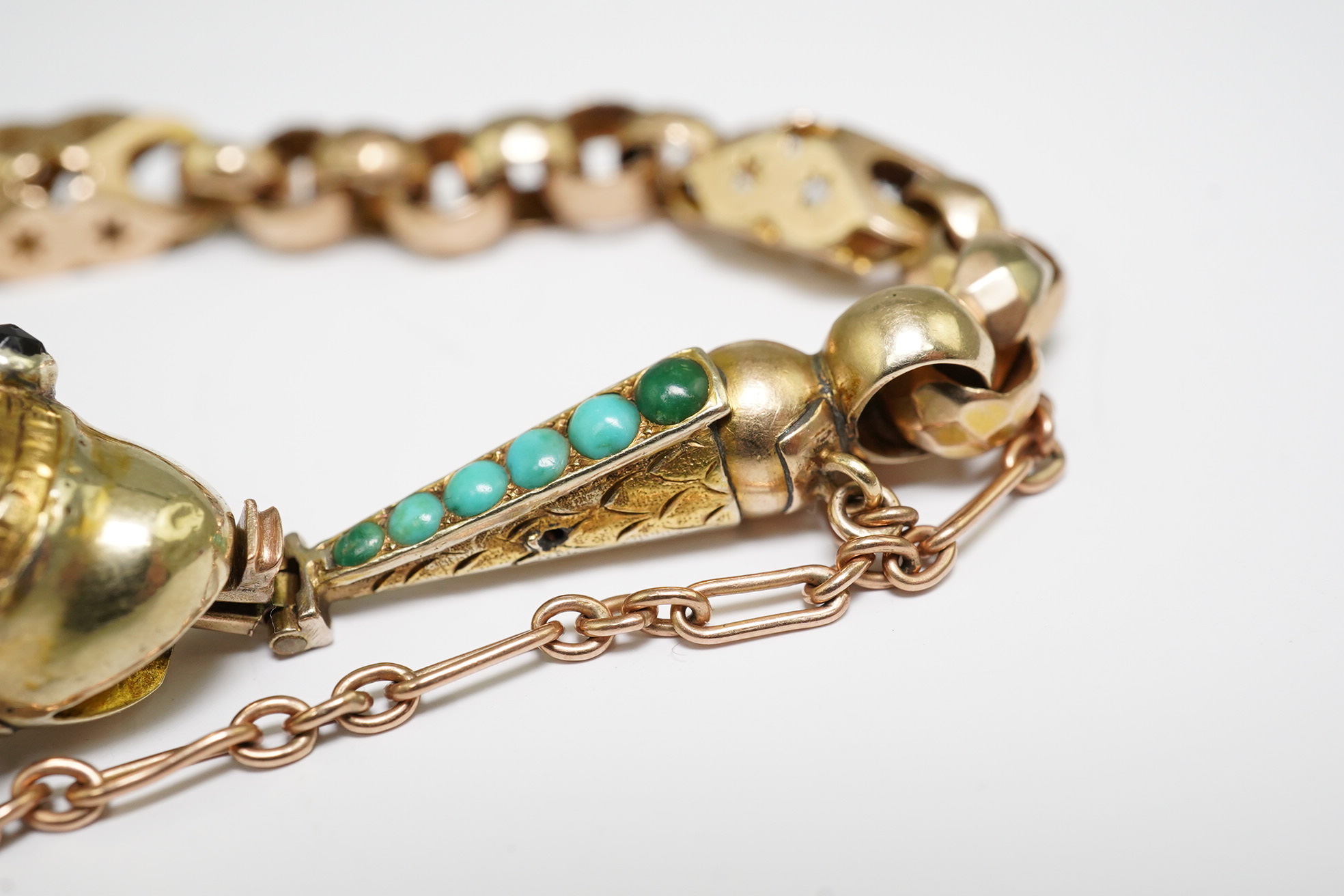 A Victorian gold and turquoise cluster set serpent bracelet